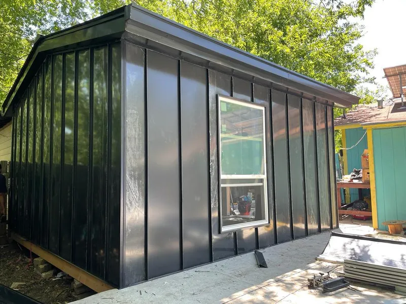 Black standing seam metal wall panels for Roof Inspection in Portland