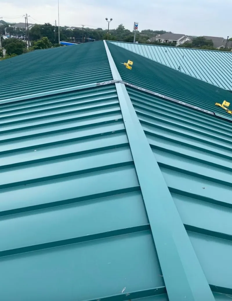 Green commercial metal roof ridge and valley for Metal Roof Repair in Portland